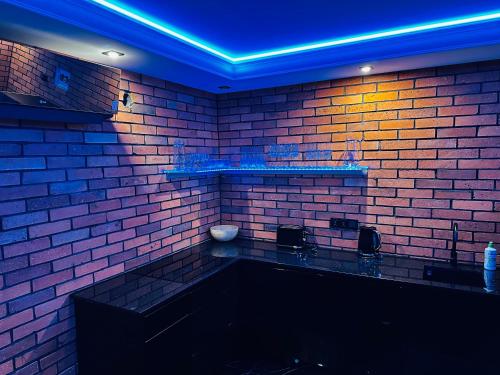 Η κουζίνα ή μικρή κουζίνα στο Lexury Apartament Sauna & Jacuzzi