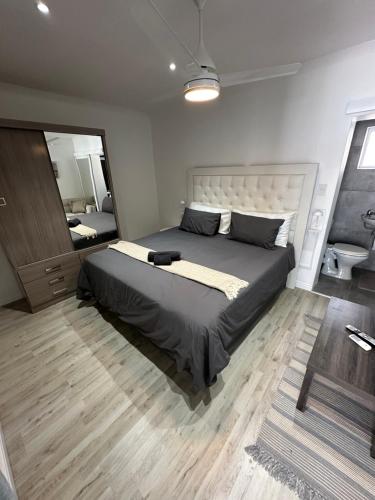 Postel nebo postele na pokoji v ubytování Skypool Guesthouse