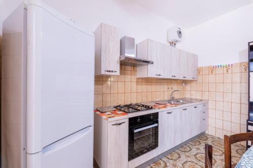 Kuchyň nebo kuchyňský kout v ubytování Villa Belvedere