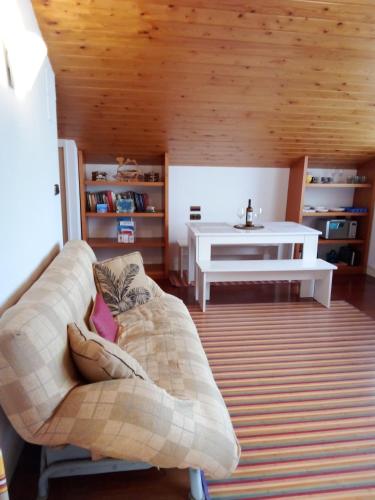 a living room with a couch and a table at Mundaka Vista Mar L-BI-52 in Mundaka