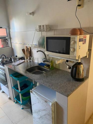 Kuchyň nebo kuchyňský kout v ubytování Complejo Heliópolis