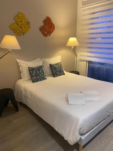 Katil atau katil-katil dalam bilik di Arthur Properties Bel Air