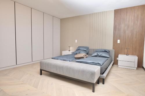 Ένα ή περισσότερα κρεβάτια σε δωμάτιο στο Luxus-Appartments neben Rhein & Reben