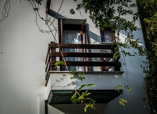a staircase in a building with a window at Nymfes in Tsagarada