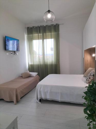 Ένα ή περισσότερα κρεβάτια σε δωμάτιο στο Lugore Room