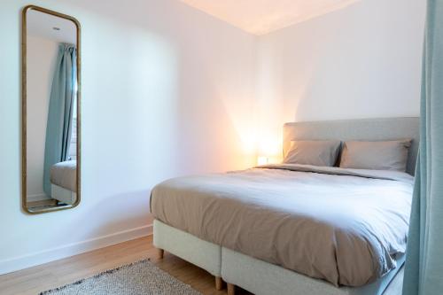 Katil atau katil-katil dalam bilik di Bright, Spacious Apartments & Perfectly Located in the Heart of Ghent