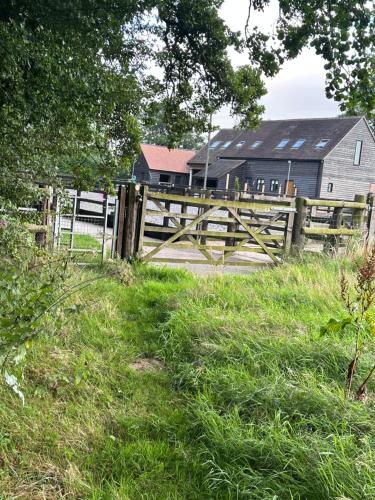 a wooden fence in front of a house at The Caradoc in Shrewsbury