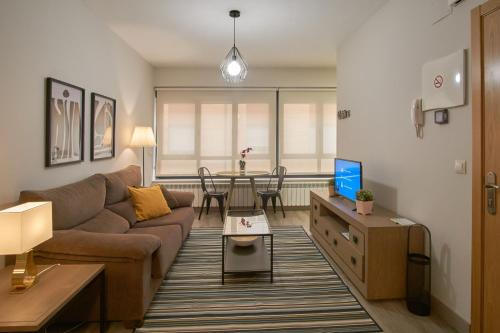 Χώρος καθιστικού στο Apartamentos Los Arroyos