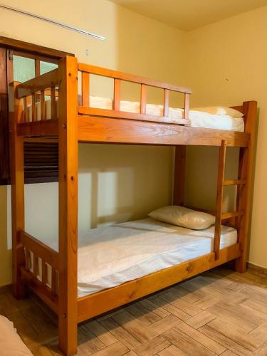 Postel nebo postele na pokoji v ubytování Hostel da rua sireita