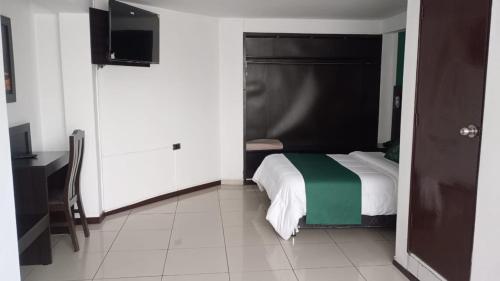 Ένα ή περισσότερα κρεβάτια σε δωμάτιο στο Hotel inka luxe casa rams