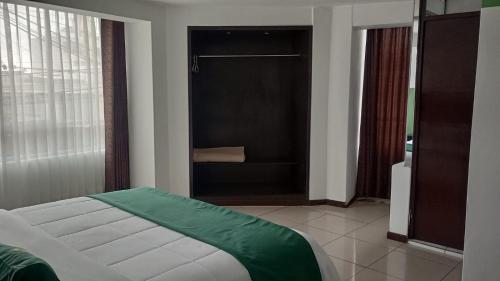 Ένα ή περισσότερα κρεβάτια σε δωμάτιο στο Hotel inka luxe casa rams