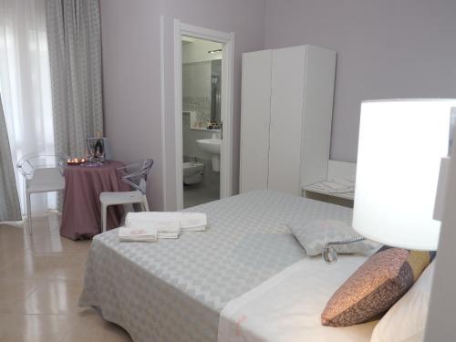 Una cama o camas en una habitación de Pepe'Accommodation