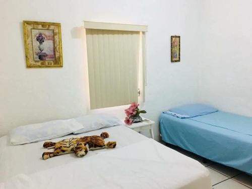Postel nebo postele na pokoji v ubytování Apartamentos Los Ángeles , Managua , Nic