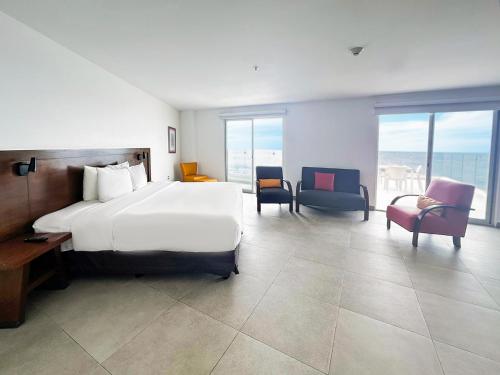 Postel nebo postele na pokoji v ubytování Park Inn by Radisson Mazatlan