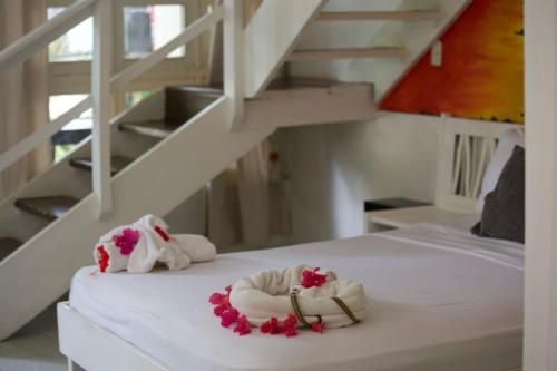 Cama o camas de una habitación en Afreeka Beach Hotel