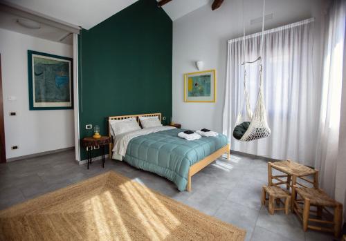 Ένα ή περισσότερα κρεβάτια σε δωμάτιο στο Residenza agli Ospedali
