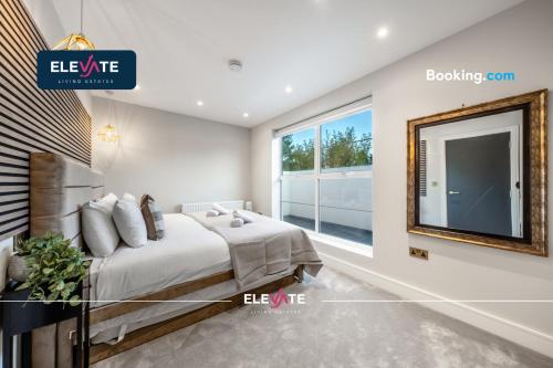 Voodi või voodid majutusasutuse 2BDRWEMBLEYFLAT l EXCLUSIVE DEALS l LAST-MINUTE ESCAPE l 1 X SUPER KING BED AND 3 SINGLE BEDS l WEMBLEY STADIUM LOCATION, FREE PARKING, SLEEPS 8 l Elevate Living Estates Short Lets & Serviced Apartments Wembley toas