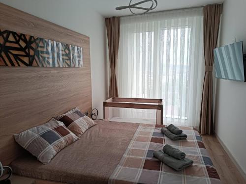 Ένα ή περισσότερα κρεβάτια σε δωμάτιο στο 19th Floor Condo in Cevahir with pool fitness
