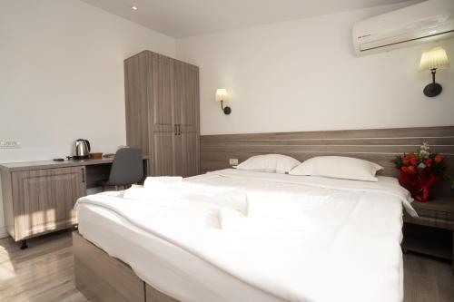 Hotel Liad City Centerにあるベッド