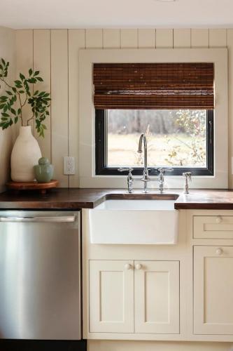 a kitchen with a sink and a window at The Bend Micro Resort in Phoenicia