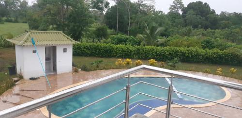 a pool on the roof of a house at Casa Finca la Parcela in San Onofre