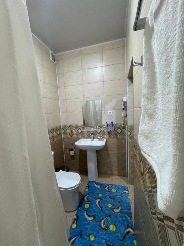 Koupelna v ubytování SNAM Hotel