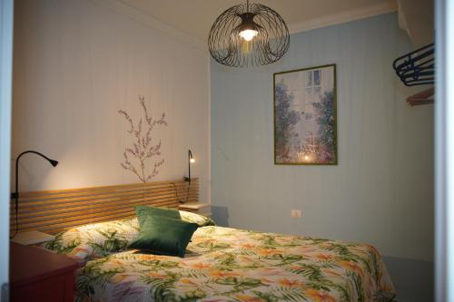 Кровать или кровати в номере Casa Vacanze De' Britti