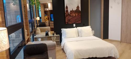 Ένα ή περισσότερα κρεβάτια σε δωμάτιο στο Junior Suite Centro Internacional