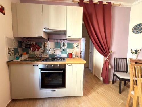 Кухня или мини-кухня в Casa Vacanze De' Britti
