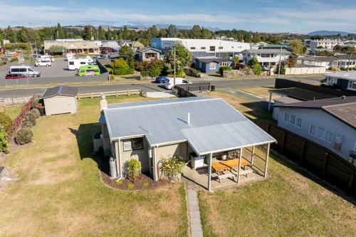 an overhead view of a house with a yard at The Crib Haven - Te Anau Holiday Home in Te Anau