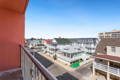 a balcony view of a town with houses and a street at Americana Motor Inn on Boardwalk in Ocean City