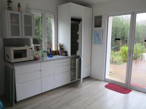 Photo de la galerie de l'établissement Résidence 004-soulac Sur Mer - 004 - Détente et repos dans cette maison à 2 pas de l'Océan MAE-6141, à Soulac-sur-Mer