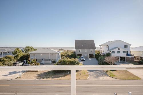 a view of houses from a street at Lily's Pad in Oak Island
