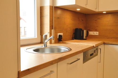 Η κουζίνα ή μικρή κουζίνα στο Gorczańskie Apartamenty Papiernia - Noclegi w górach Gorce