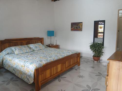 Una cama o camas en una habitación de finca nalu