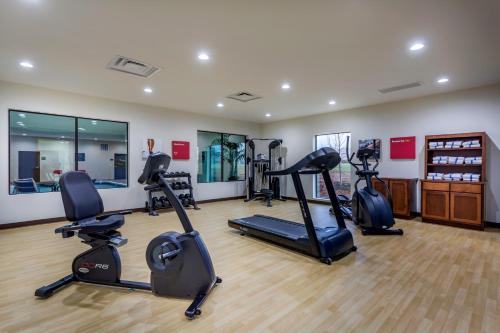 a gym with several treadmills and exercise bikes in it at Comfort Suites Bowling Green Southeast in Bowling Green