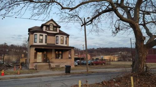 a small house on the corner of a street at Valley and city views in Steubenville