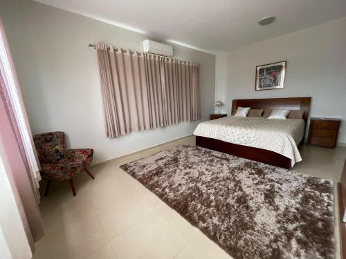 Postel nebo postele na pokoji v ubytování Refúgio Santo Hilário