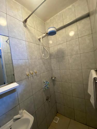 Koupelna v ubytování Feel home -studio with swimming pool