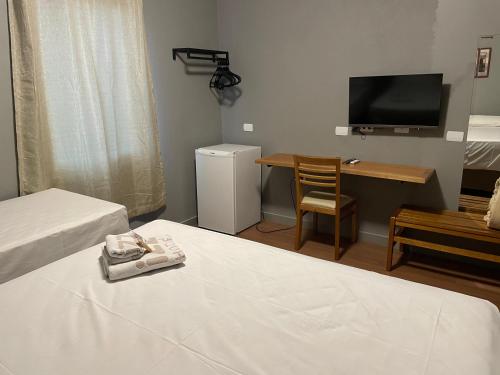 Foto da galeria de Izzi Hotéis em Santa Juliana