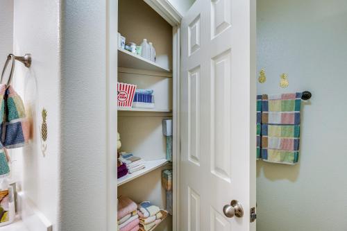a closet with a door open with towels at Sunny Lodi Getaway - Walk to Downtown and Wineries in Lodi