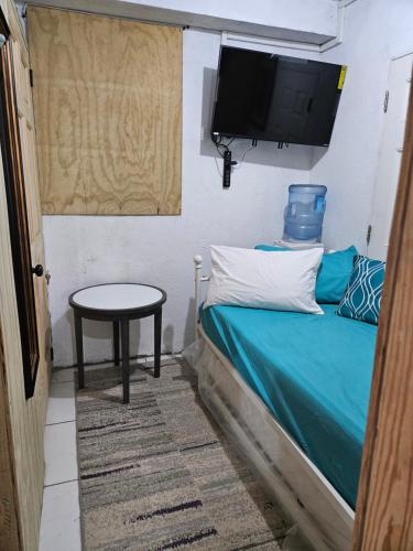 Una cama o camas en una habitación de Cher Candy Night Rest