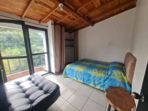 Postel nebo postele na pokoji v ubytování Aparta estudio campestre