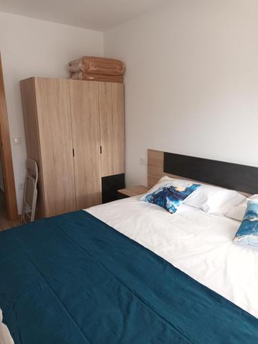Ένα ή περισσότερα κρεβάτια σε δωμάτιο στο Apartamentos Mis Casitas