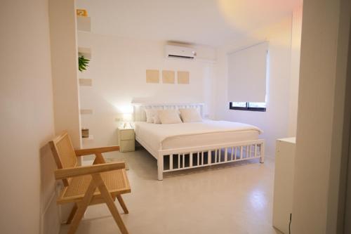 Ένα ή περισσότερα κρεβάτια σε δωμάτιο στο Place Hotel