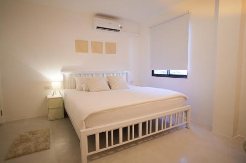 Ένα ή περισσότερα κρεβάτια σε δωμάτιο στο Place Hotel