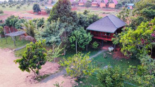 an aerial view of a house in a garden at Cardamom Community Center in Moăt Preăh