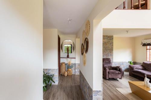 Posezení v ubytování Country house with fireplace and mountain view