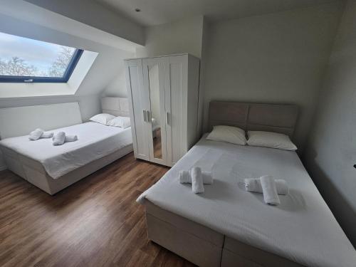 Postel nebo postele na pokoji v ubytování Velvet House