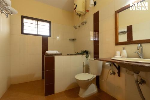 Bilik mandi di Three Rivers by VEO - Part of StayVista